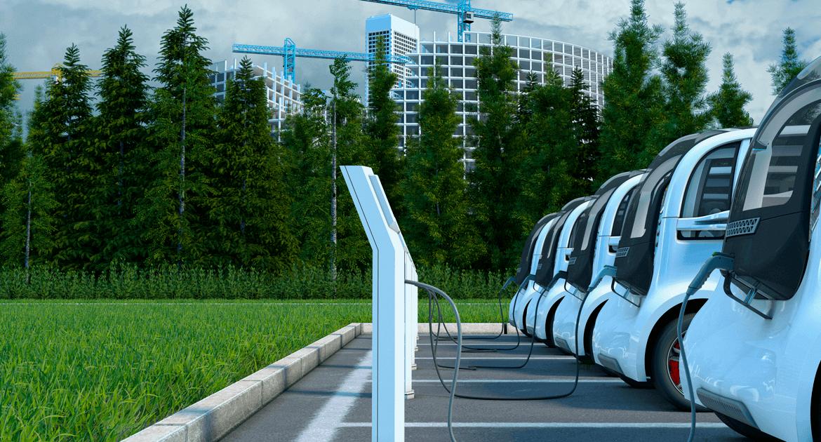 Carros elétricos menos poluentes sendo carregados Carros elétricos menos poluentes sendo carregados
